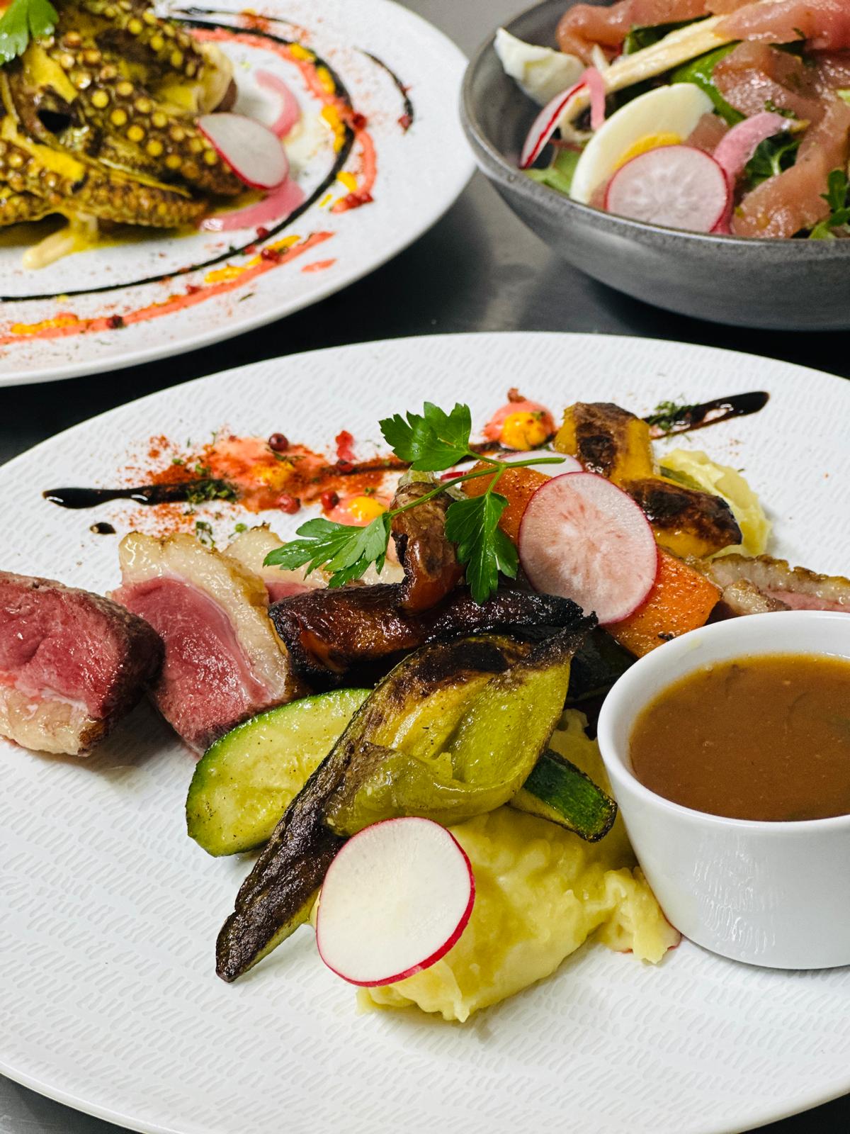 Duck breast with seasonal vegetables